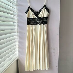 Elegant Cream and Black Lace Dress